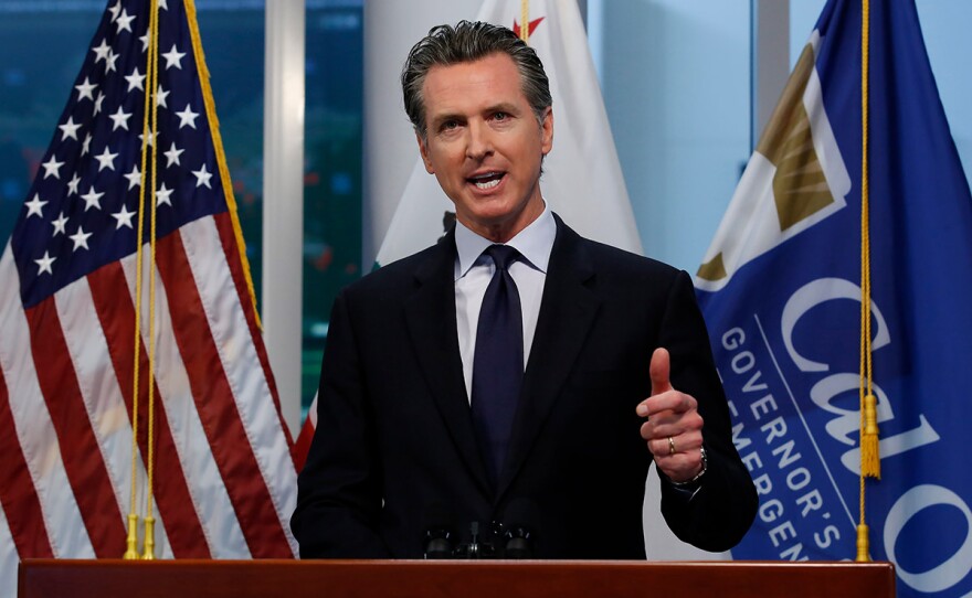 Gov. Gavin Newsom updates the state's response to the coronavirus, at the Governor's Office of Emergency Services in Rancho Cordova, Calif., Monday, March 30, 2020. 