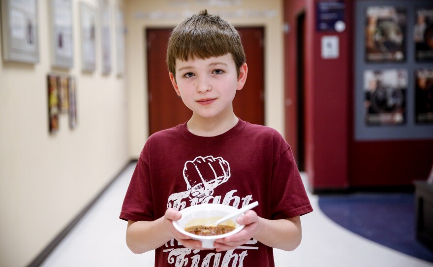Gabe Schenk, 12, says the secret to cooking is that you have to talk to your food.