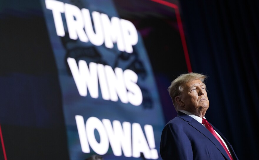 Republican presidential candidate former President Donald Trump speaks at a caucus night party in Des Moines, Iowa on Monday.