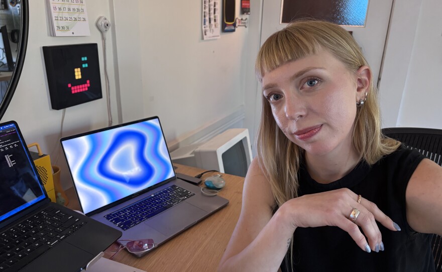 Digital artist Kyt Janae's San Francisco studio is packed with Apple laptops and desktops. She says she uses these machines in all her creative projects.