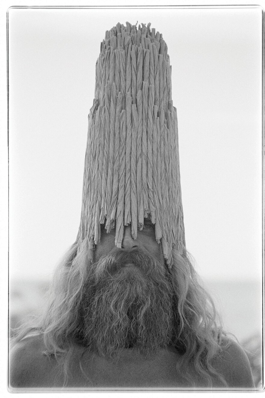 "Model wearing 'Sun Bishop,'" by moses, will be on view alongside the actual paper bag hat at the Mingei, Apr. 8 through Oct. 2, 2022.