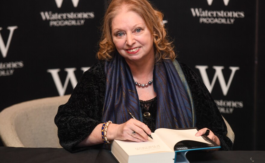 Hilary Mantel signs a copy of <em>The Mirror & the Light</em> in London on March 4, 2020.