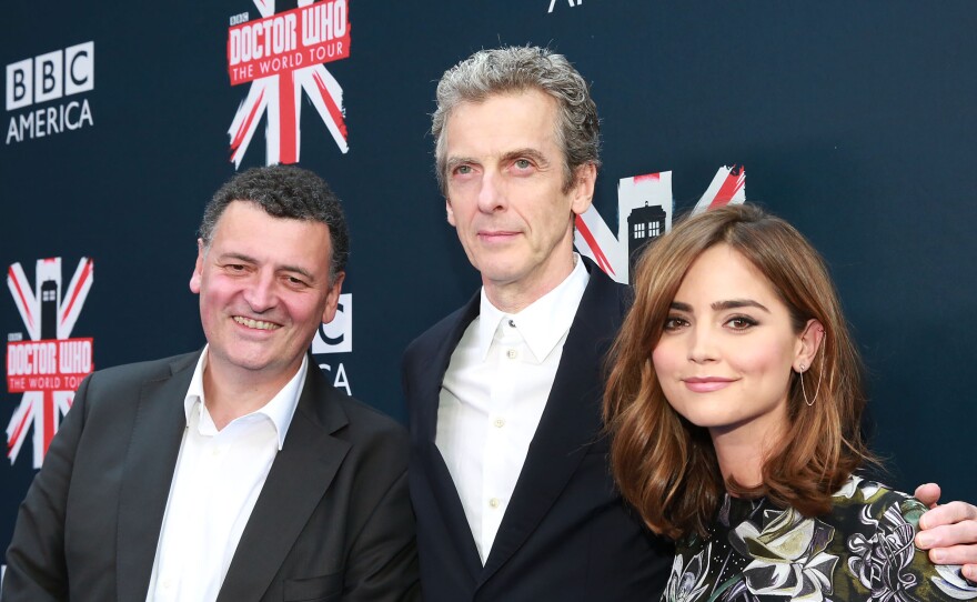 Doctor Who executive producer Steven Moffat (left), appears with series star Peter Capaldi (center) and Jenna Coleman in New York City.