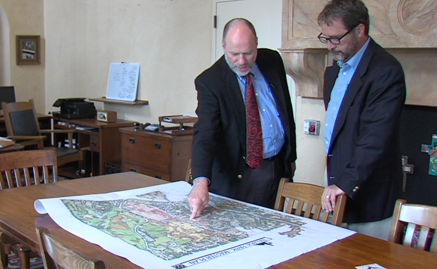 CEO of the Balboa Park Conservancy Thomas Herrera-Mishler shows KPBS Editor Tom Fudge a map of the Balboa Park Master Plan, July 7, 2015.