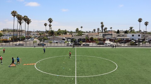 Students play soccer at Wilson Middle School's soccer field on Monday, July 21, 2025.