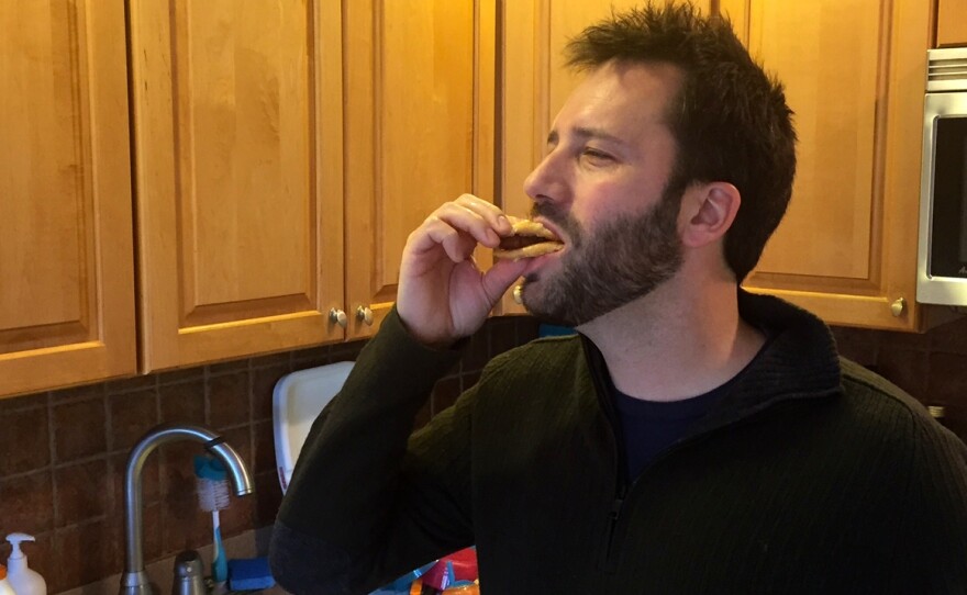 Not pictured: the treadmill Dan is standing on. Just 18 more miles and he'll have worked off half of this sandwich!