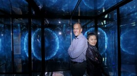 Scripps Institution of Oceanography marine biologist Michael Latz (left) with artist Ivyone Khoo in an undated photo. Khoo worked with Latz to film bioluminescent creatures for her Infinity Cube exhibit at the Birch Aquarium. 