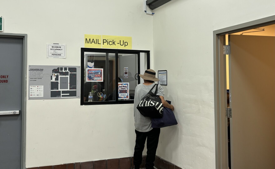 Someone picks up their mail at the Father Joe's Villages day center on Oct. 14, 2026.
