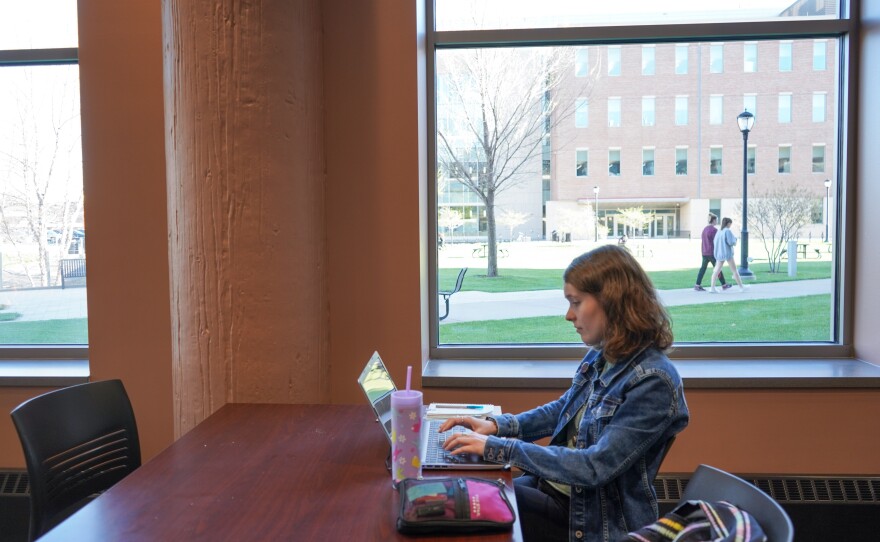 Danielle Hoffman, a senior at the University of Wisconsin La Crosse, studies for finals at the campus student union.