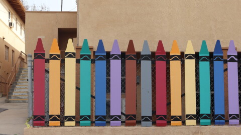 A crayon-shaped fence near a school playground at St. Katharine Drexel Academy in El Cerrito is shown on Dec. 31, 2024.