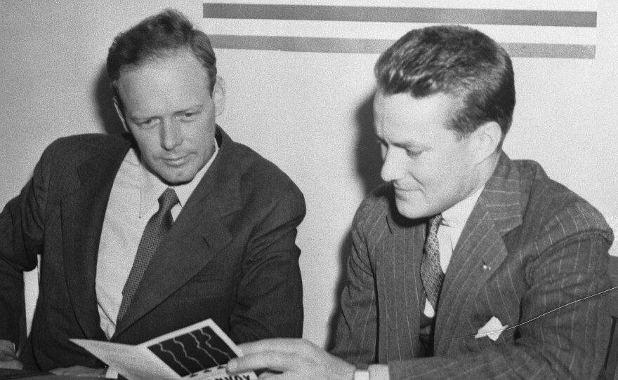 Col. Charles A. Lindbergh (left) with R. Douglas Stuart, Jr., National Director of the America First Committee, when the aviator enrolled in Chicago as a member of the AFC.