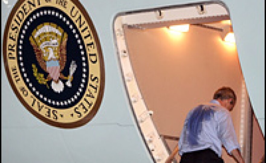 The president boards Air Force One after speaking about Hurricane Katrina's damage.