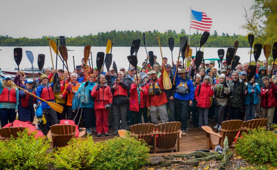 Amy and Dave Freeman's friends, family and supporters gather at River Point Resort and Outfitting Company in Ely, Minn., across from the proposed Twin Metals mine site, in preparation for the couple's launch on Sept. 23.