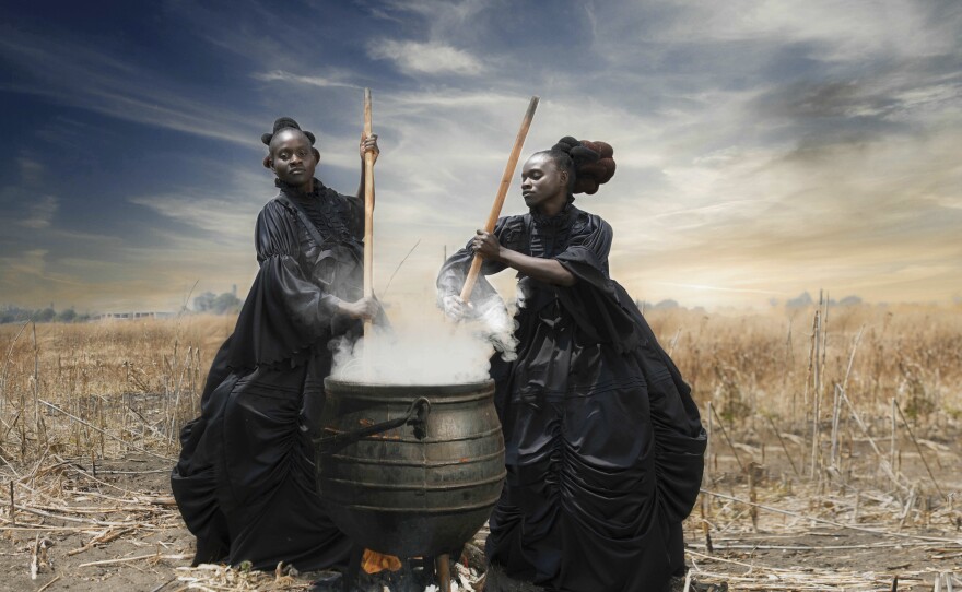 In<em> That Evening Sun Goes Down, </em>two women stir a large cooking pot — an African vessel still used to prepare food for large gatherings.