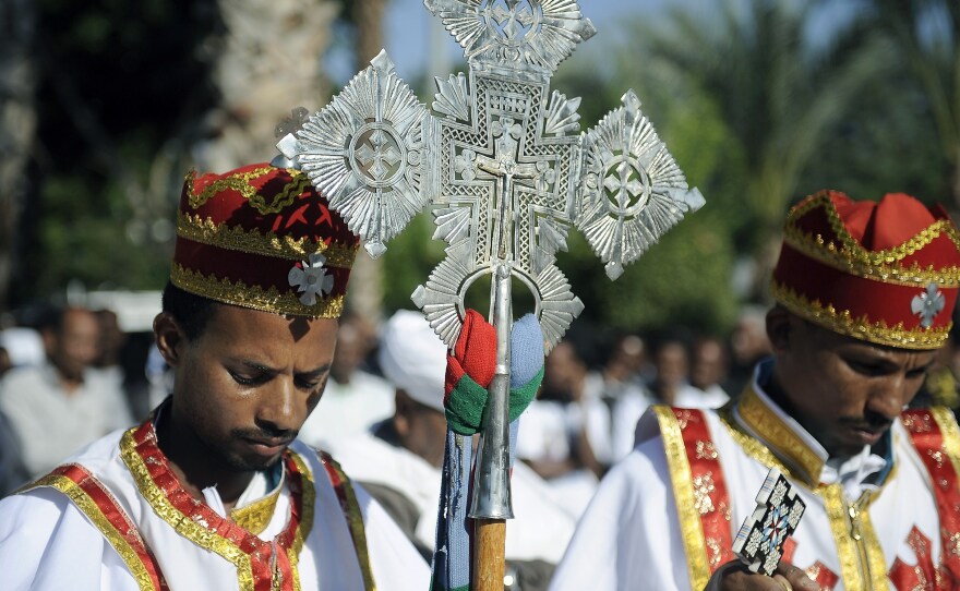 Eritrean Christians lead a memorial service in Tel Aviv in October in honor of victims of the Lampedusa, an immigrant boat shipwrecked off Italy in October. The number of African Christians in Israel is rising.