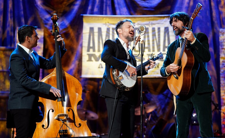 (L-R) Bob Crawford, Scott Avett and Seth Avett of The Avett Brothers performs onstage for the 22nd Annual Americana Honors & Awards at Ryman Auditorium on Sept. 20, 2023 in Nashville, Tenn.