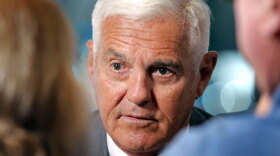 General Motors Vice Chairman Bob Lutz, shown at the GM exhibit at the North American International Auto Show in Detroit on Monday, says China is becoming the "center of gravity" of the global automobile business.