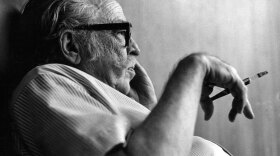 Photo of Dalton Trumbo smoking a cigarette taken in 1971. 