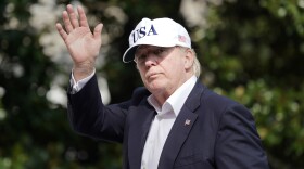 President Donald Trump waves as he walks across the South Lawn of the White House in Washington, Sunday, Aug. 27, 2017.