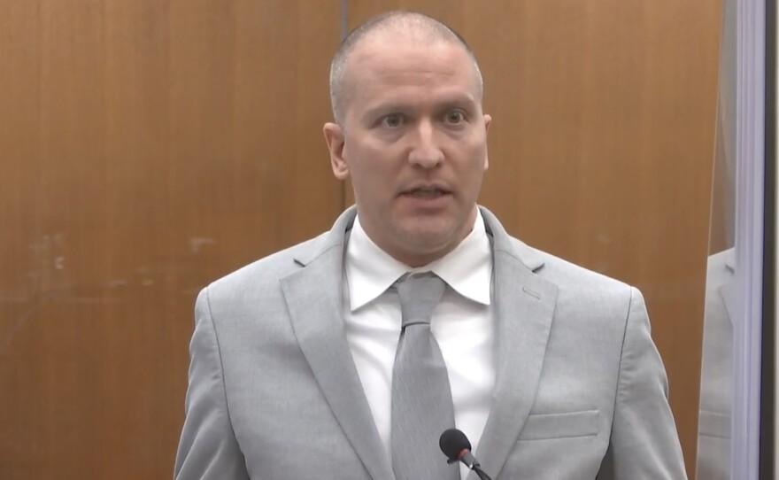 Former Minneapolis police Officer Derek Chauvin addresses the court as Hennepin County Judge Peter Cahill presides over Chauvin's sentencing on Friday at the Hennepin County Courthouse in Minneapolis.