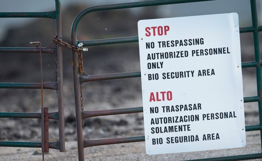 A gate blocks the entrance of a farm operated by Daybreak Foods, on May 17, 2015 near Eagle Grove, Iowa. The facility was reportedly struck by the current outbreak of bird flu. Secretary of Agriculture Tom Vilsick says biosecurity measures are crucial to containing the spread of the disease, which has only infected birds, not humans.
