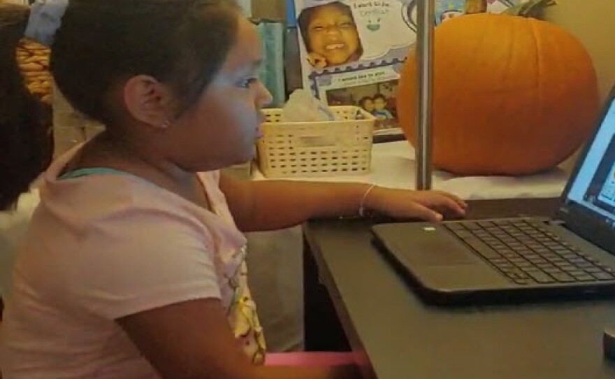Jasmine Hernandez attends Kindergarten over Zoom from her North Park home, Oct. 15, 2020.