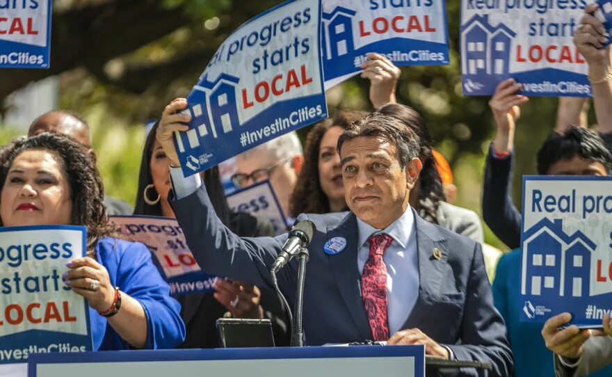 Artesia Councilmember Ali Sajad Taj, president of the League of California Cities, speaks during a rally at the state Capitol in Sacramento on April 12, 2023.