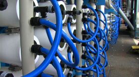 Blue pipes hooked up to filter canisters inside the Carlsbad desalination facility on July 8, 2015. 
