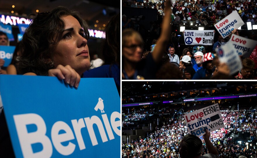 Sanders supporters voice their opinions during Monday evening's program at the Democratic National Convention.