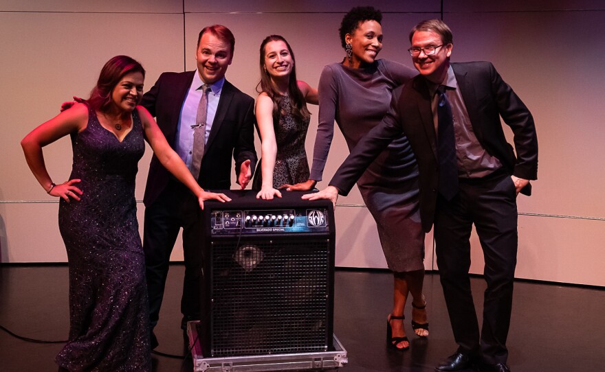 The Apollo Chamber Players pose before their fall concert, "Banned" in Houston with a guest instrument — a stomp<em> </em>box — and composer and performer Allison Loggins-Hull.
