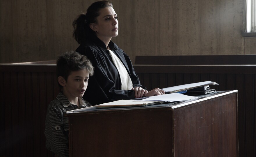 <em></em>In <em>Capernaum</em>, Zain (Zain Al Rafeea) takes the stand to sue his parents. In a cameo appearance, his lawyer is played by the film's director, Nadine Labaki.