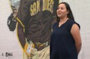 Liz Baltazar speaks about the San Diego Padres in front of a mural of Manny Machado in Chula Vista, April 24, 2023.