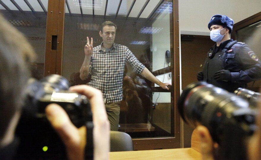 Russian opposition leader Alexei Navalny stands in a Moscow courtroom on Saturday. The court turned down an appeal against his prison sentence.