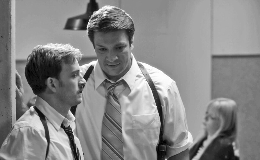 Tom Lenk and Nathan Fillian star as inept officers in Joss Whedon's adaptation of William Shakespeare's "Much Ado About Nothing."