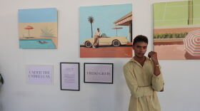 Fredo Gillis stands in front of his paintings at San Diego Made Factory on Sept. 22, 2026.