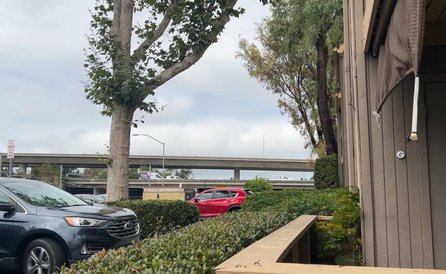 A view from an apartment complex in Mission Valley, San Diego. You can see the I-15 freeway in the background.
