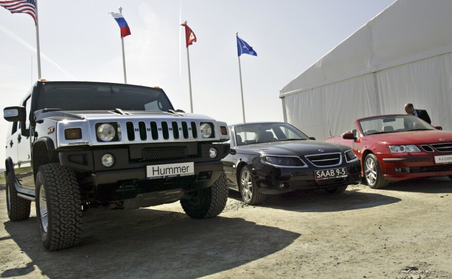 Cars produced by General Motors are on display at the ground-breaking ceremony of a GM plant in Shushary, on the outskirts of St. Petersburg, Russia, on June 13, 2006.