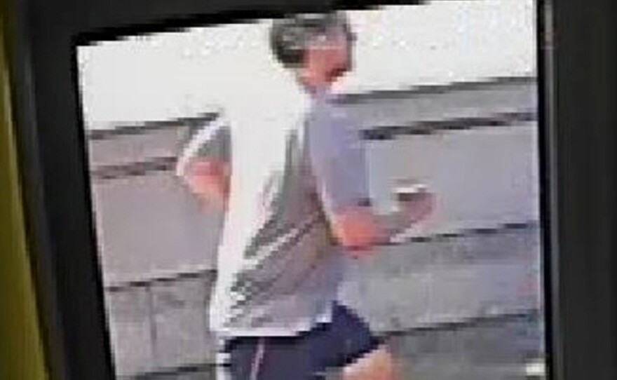 A CCTV image, received via the Metropolitan Police Service, shows a male jogger on Putney Bridge in London on May 5.