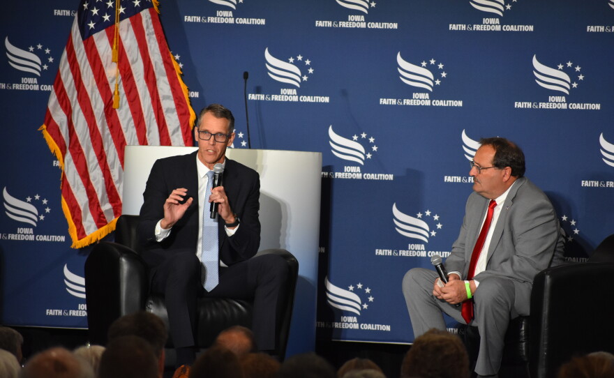 Republican Iowa Rep. Randy Feenstra (left) speaks with Iowa Republican Party Chairman Jeff Kaufmann at the Iowa Faith and Freedom Coalition's Spring Kickoff event May 1, 2026.