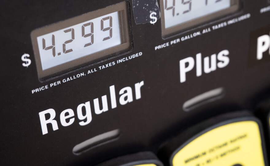 A gasoline pump displays fuel prices at a gas station in Falls Church, Va., on Tuesday.