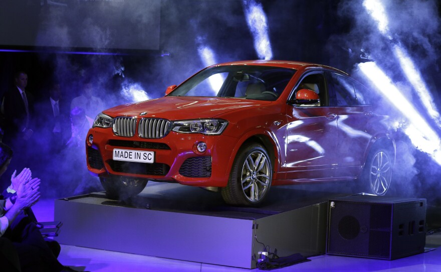 A new BMW X4 vehicle is unveiled during a March 2014 news conference at the BMW manufacturing plant in Greer, S.C.