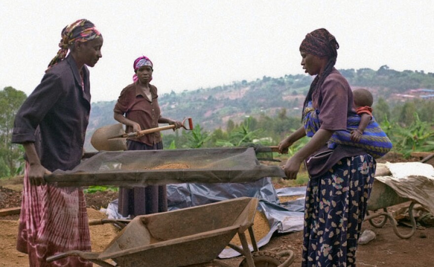 Women inspect clay that will be used for a new floor near Masoro, Rwanda. "Sieving out rocks and clumps allows the floor to have a smooth and fine surface," says Gayatri Datar, whose NGO, EarthEnable, is installing new, earthen floors in homes where ordinary dirt floors pose health risks.