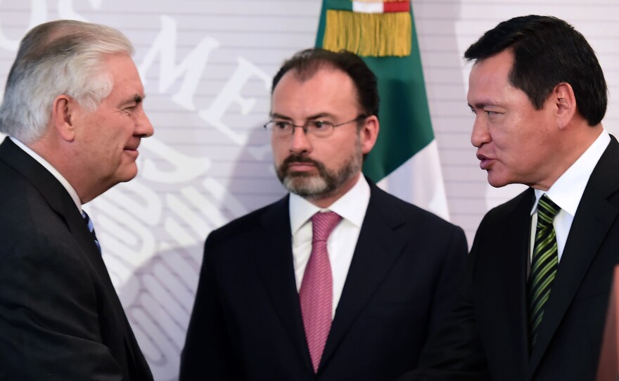 Secretary of State Rex Tillerson (from left), Mexican Foreign Minister Luis Videgaray and Mexican Interior Minister Miguel Angel Osorio Chong greet each other during a news conference in Mexico City on Thursday.