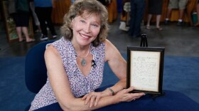 A guest with her Abraham Lincoln letter.