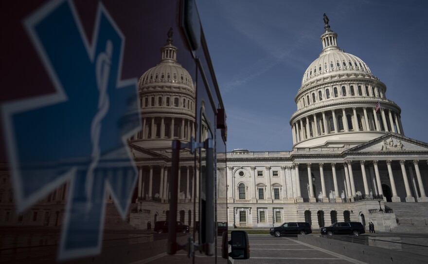 An ambulance sits outside the U.S. Capitol Monday.
