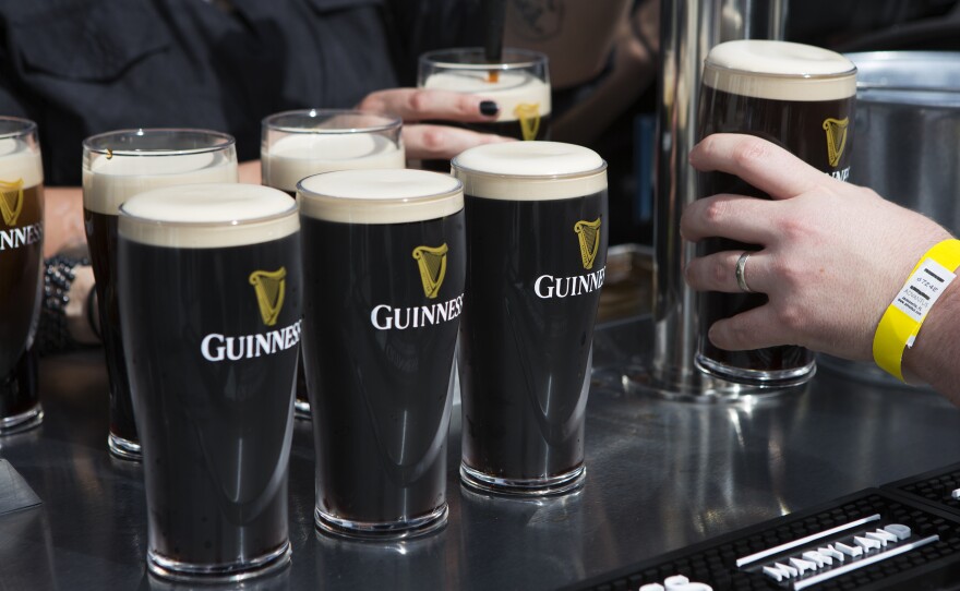 Pints of Guinness stouts are lined up at one of the outdoor bars at the new brewery. Guinness, famous for making stout beer, opened a new brewery in Maryland this week. It's the first time Guinness has had a brewery in the U.S. in more than 60 years.