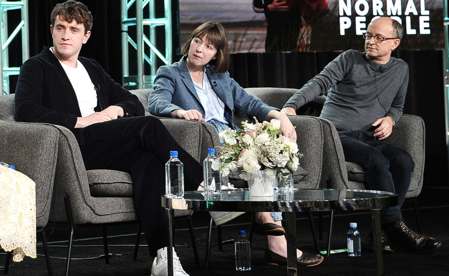 FILE - From left, Paul Mescal, Sally Rooney and Ed Guiney participate in Hulu's "Normal People" panel during the Winter 2020 Television Critics Association Press Tour on Jan. 17, 2020, in Pasadena, Calif.