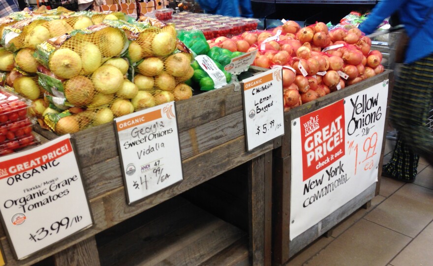 Whole Foods says its new rating system is a way to talk to farmers and customers about issues that the organic rules don't encompass, like water, energy, labor and waste.