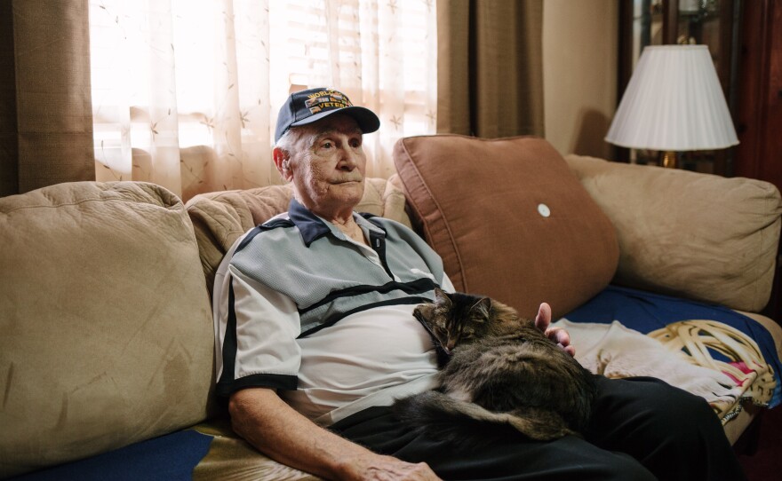 Harry Bollinger, 88, of Freeport, Pa., pauses as he talks about his recovery from mustard gas exposure as part of an experiment at the Naval Research Laboratory in Washington, D.C.