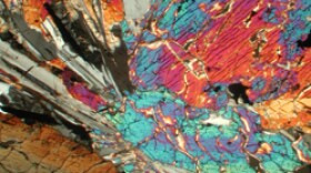 A cross-polarized transmitted-light image of a polished section of Apollo sample 12021.